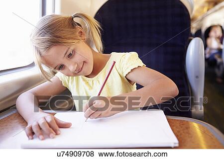 Girl Drawing Picture On Train Journey View Large Photo Image Stock Photo - Girl Drawing Picture On Train Journey. Fotosearch
