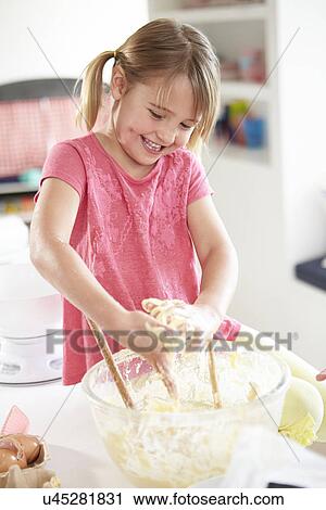 Girl Making Cupcakes In Kitchen View Large Photo Image Stock Image - Girl Making Cupcakes In Kitchen. Fotosearch
