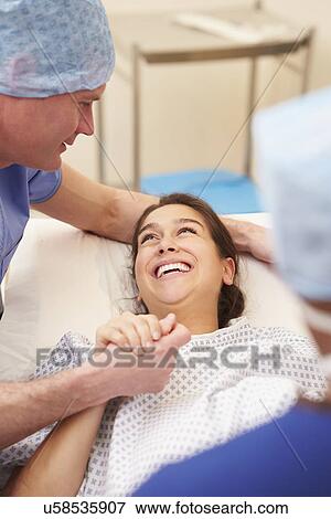 Stock Photo - Husband Supporting Wife Through IVF Treatment. Fotosearch