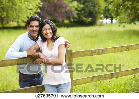 Indian Couple Walking In Countryside View Large Photo Image Stock Image - Indian Couple Walking In Countryside. Fotosearch