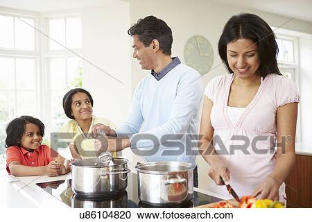 Indian Family Cooking Meal At Home View Large Photo Image Stock Image - Indian Family Cooking Meal At Home. Fotosearch