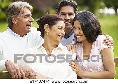 Picture - Indian Family Walking In Countryside. Fotosearch