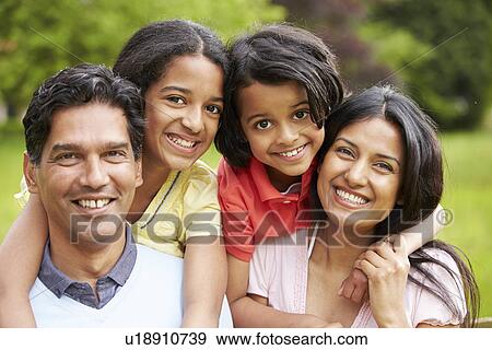 Stock Photo - Indian Family Walking In Countryside. Fotosearch