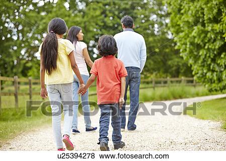 Indian Family Walking In Countryside View Large Photo Image Stock Photo - Indian Family Walking In Countryside. Fotosearch