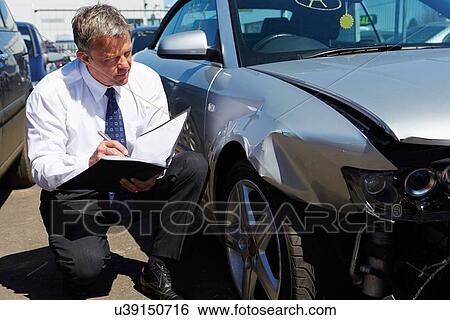 Loss Adjuster Inspecting Car Involved In Accident View Large Photo Image Stock Photograph - Loss Adjuster Inspecting Car Involved In Accident. Fotosearch