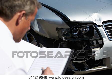 Loss Adjuster Inspecting Car Involved In Accident View Large Photo Image Stock Photograph - Loss Adjuster Inspecting Car Involved In Accident. Fotosearch