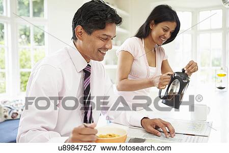 Man Having Breakfast Before Going To Work View Large Photo Image Stock Photo - Man Having Breakfast Before Going To Work. Fotosearch
