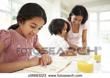 Mother Helping Children With Homework View Large Photo Image Stock Image - Mother Helping Children With Homework. Fotosearch