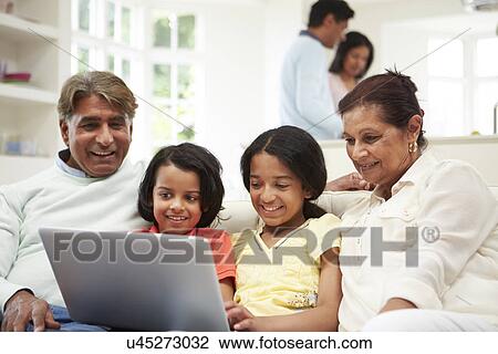 Multi-Generation Indian Family With Laptop View Large Photo Image Stock Image - Multi-Generation Indian Family With Laptop. Fotosearch