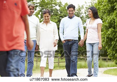 Muti-Generation Indian Family Walking In Countryside View Large Photo Image Stock Image - Muti-Generation Indian Family Walking In Countryside. Fotosearch