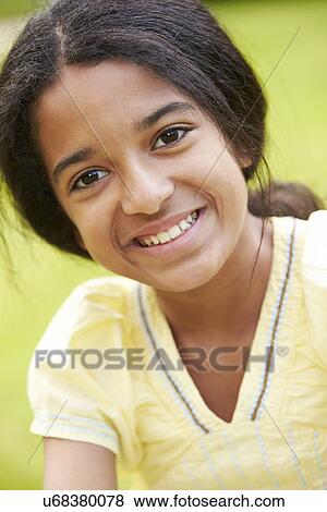 Stock Photo - Outdoor Portrait Of Indian Girl. Fotosearch