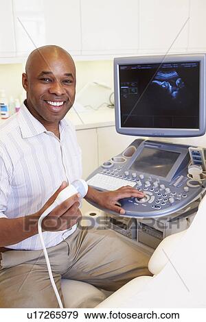 Portrait Of 4D Ultrasound Scanning Machine Operator View Large Photo Image Stock Photo - Portrait Of 4D Ultrasound Scanning Machine Operator. Fotosearch