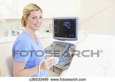 Portrait Of 4D Ultrasound Scanning Machine Operator View Large Photo Image Stock Photo - Portrait Of 4D Ultrasound Scanning Machine Operator. Fotosearch