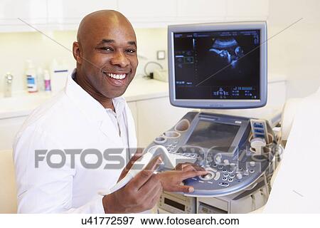 Stock Photo - Portrait Of 4D Ultrasound Scanning Machine Operator. Fotosearch