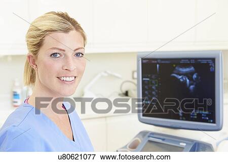 Stock Photo - Portrait Of 4D Ultrasound Scanning Machine Operator. Fotosearch