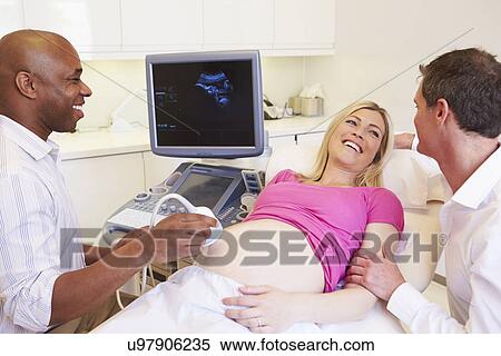 Stock Photography - Portrait Of 4D Ultrasound Scanning Machine Operator. Fotosearch