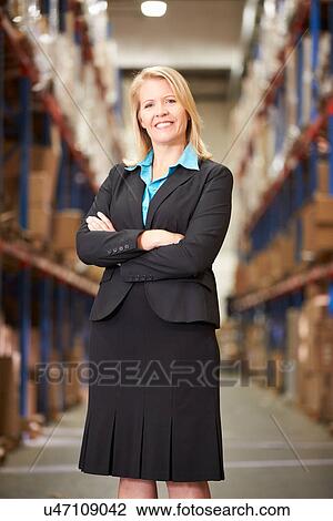 Portrait Of Female Manager In Warehouse View Large Photo Image Stock Image - Portrait Of Female Manager In Warehouse. Fotosearch