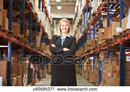 Portrait Of Female Manager In Warehouse View Large Photo Image Stock Photo - Portrait Of Female Manager In Warehouse. Fotosearch