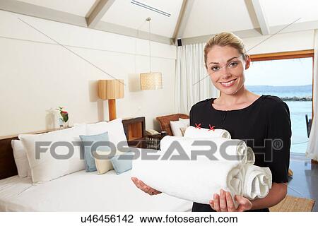 Portrait Of Hotel Chambermaid With Towels View Large Photo Image Stock Image - Portrait Of Hotel Chambermaid With Towels. Fotosearch