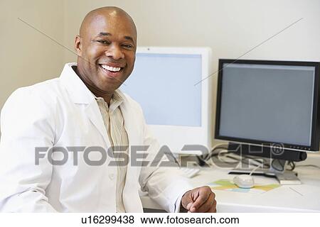 Stock Photo - Portrait Of Male Obstetrician In Hospital. Fotosearch
