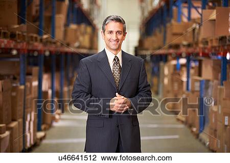 Portrait Of Manager In Warehouse View Large Photo Image Stock Image - Portrait Of Manager In Warehouse. Fotosearch