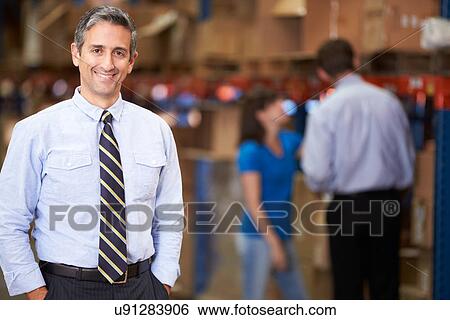 Portrait Of Manager In Warehouse View Large Photo Image Stock Photograph - Portrait Of Manager In Warehouse. Fotosearch