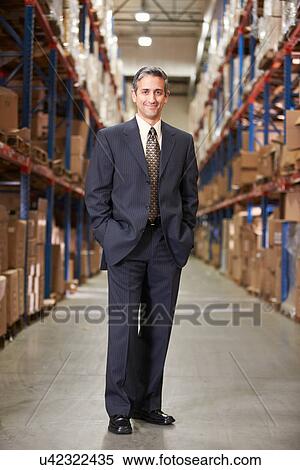 Portrait Of Manager In Warehouse View Large Photo Image Stock Photography - Portrait Of Manager In Warehouse. Fotosearch
