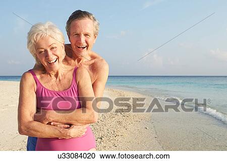 Portrait Of Senior Couple On Tropical Beach Holiday View Large Photo Image Stock Image - Portrait Of Senior Couple On Tropical Beach Holiday. Fotosearch