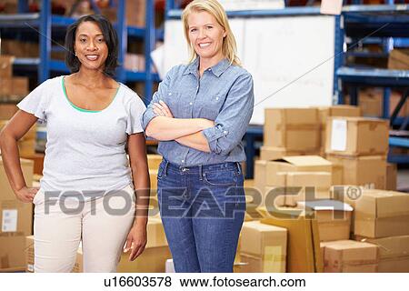 Portrait Of Workers In Distribution Warehouse View Large Photo Image Stock Photo - Portrait Of Workers In Distribution Warehouse. Fotosearch