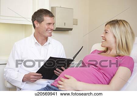 Pregnant Woman Being Given Ante Natal Check By Doctor View Large Photo Image Stock Image - Pregnant Woman Being Given Ante Natal Check By Doctor. Fotosearch