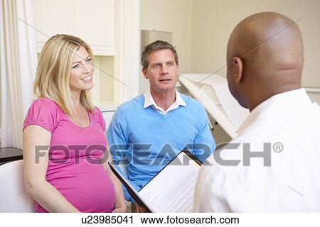Pregnant Woman Being Given Ante Natal Check By Doctor View Large Photo Image Stock Image - Pregnant Woman Being Given Ante Natal Check By Doctor. Fotosearch