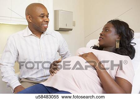 Pregnant Woman Being Given Ante Natal Check By Doctor View Large Photo Image Stock Photography - Pregnant Woman Being Given Ante Natal Check By Doctor. Fotosearch