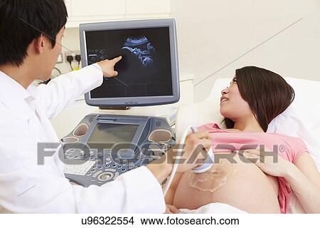 Pregnant Woman Having 4D Ultrasound Scan View Large Photo Image Picture - Pregnant Woman Having 4D Ultrasound Scan. Fotosearch