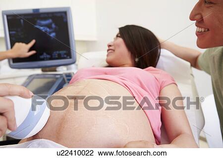 Pregnant Woman Having 4D Ultrasound Scan View Large Photo Image Stock Image - Pregnant Woman Having 4D Ultrasound Scan. Fotosearch
