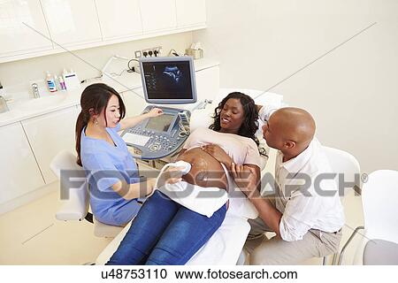 Pregnant Woman Having 4D Ultrasound Scan View Large Photo Image Stock Image - Pregnant Woman Having 4D Ultrasound Scan. Fotosearch