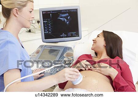 Pregnant Woman Having 4D Ultrasound Scan View Large Photo Image Stock Photo - Pregnant Woman Having 4D Ultrasound Scan. Fotosearch