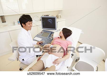 Pregnant Woman Having 4D Ultrasound Scan View Large Photo Image Stock Photo - Pregnant Woman Having 4D Ultrasound Scan. Fotosearch