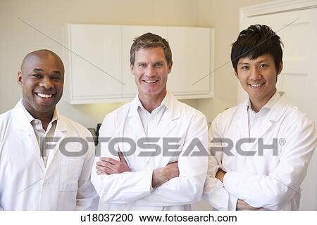 Stock Image - Pregnant Woman Meeting With Nurse In Clinic. Fotosearch