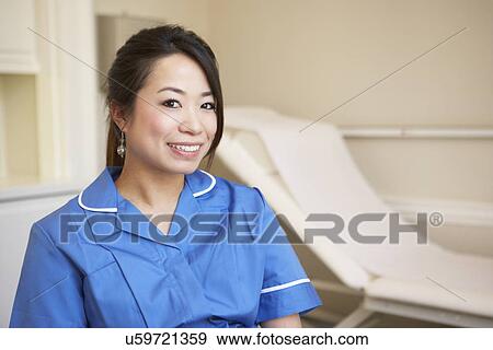 Stock Photo - Pregnant Woman Meeting With Nurse In Clinic. Fotosearch
