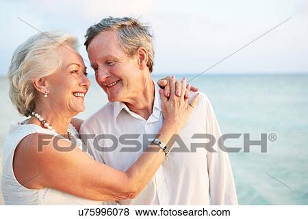 Senior Couple Getting Married In Beach Ceremony View Large Photo Image Stock Photo - Senior Couple Getting Married In Beach Ceremony. Fotosearch