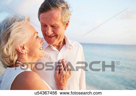 Senior Couple Getting Married In Beach Ceremony View Large Photo Image Stock Photograph - Senior Couple Getting Married In Beach Ceremony. Fotosearch