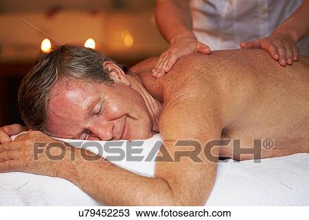 Senior Man Having Massage In Spa View Large Photo Image Stock Image - Senior Man Having Massage In Spa. Fotosearch