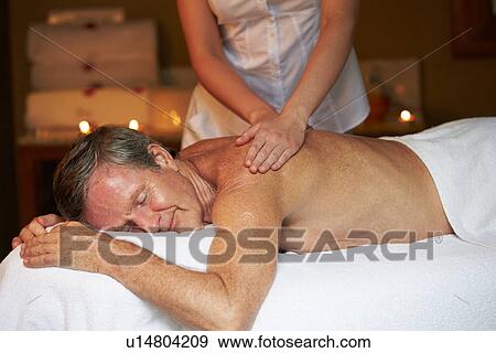 Senior Man Having Massage In Spa View Large Photo Image Stock Photo - Senior Man Having Massage In Spa. Fotosearch
