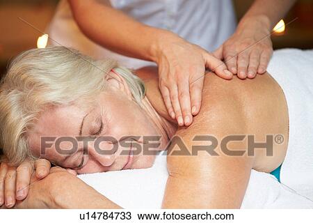 Senior Woman Having Massage In Spa View Large Photo Image Stock Image - Senior Woman Having Massage In Spa. Fotosearch
