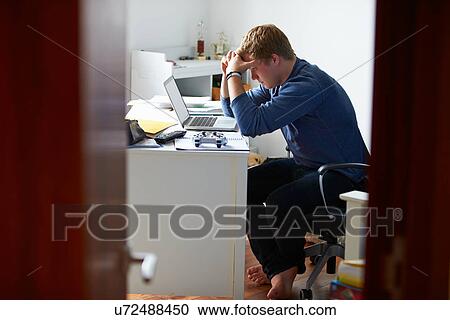 Teenage Boy Studying In Bedroom Using Laptop View Large Photo Image Stock Image - Teenage Boy Studying In Bedroom Using Laptop. Fotosearch