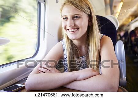 Teenage Girl Relaxing On Train Journey View Large Photo Image Stock Image - Teenage Girl Relaxing On Train Journey. Fotosearch