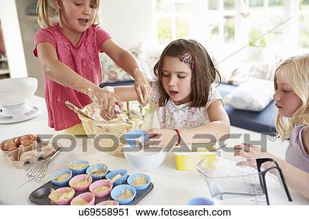 Three Girls Making Cupcakes In Kitchen View Large Photo Image Stock Image - Three Girls Making Cupcakes In Kitchen. Fotosearch