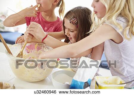 Three Girls Making Cupcakes In Kitchen View Large Photo Image Stock Photograph - Three Girls Making Cupcakes In Kitchen. Fotosearch