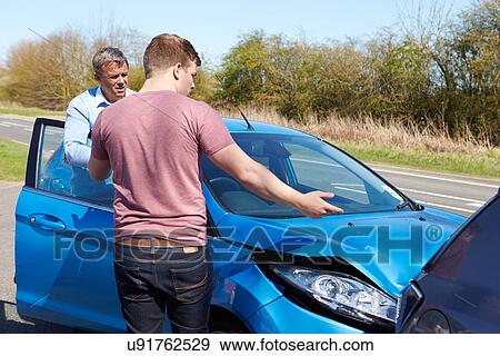 Stock Photo - Two Drivers Arguing After Traffic Accident. Fotosearch