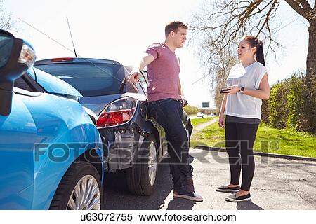 Stock Photography - Two Drivers Arguing After Traffic Accident. Fotosearch